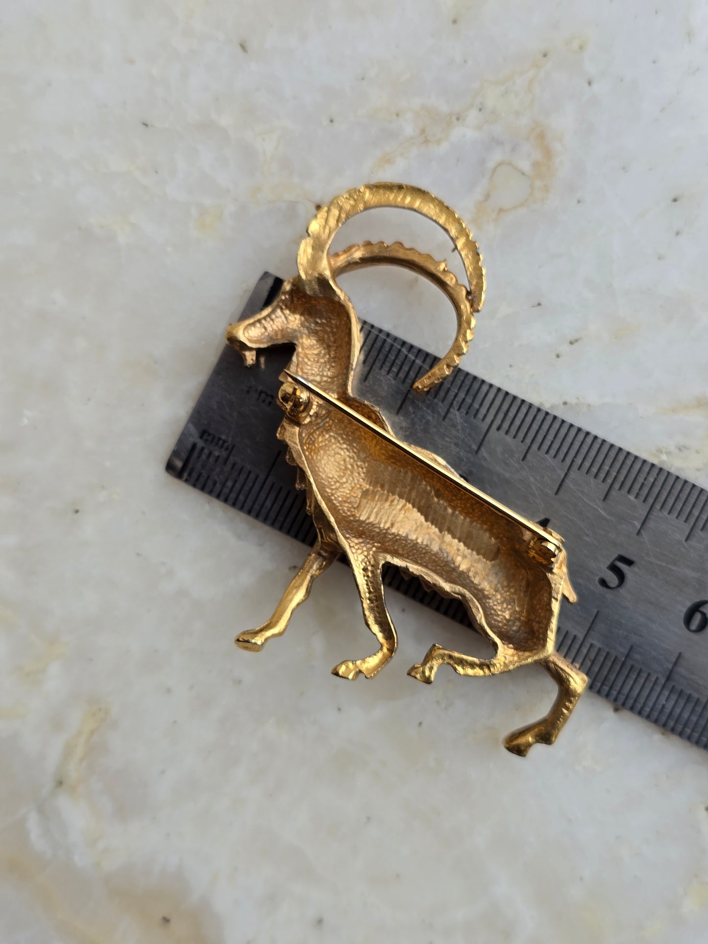 Vintažinė sagė kalnų ožys