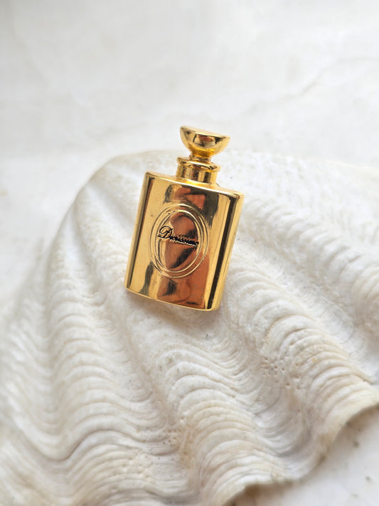Vintažinė CHRISTIAN DIOR sagė kvepalų buteliukas