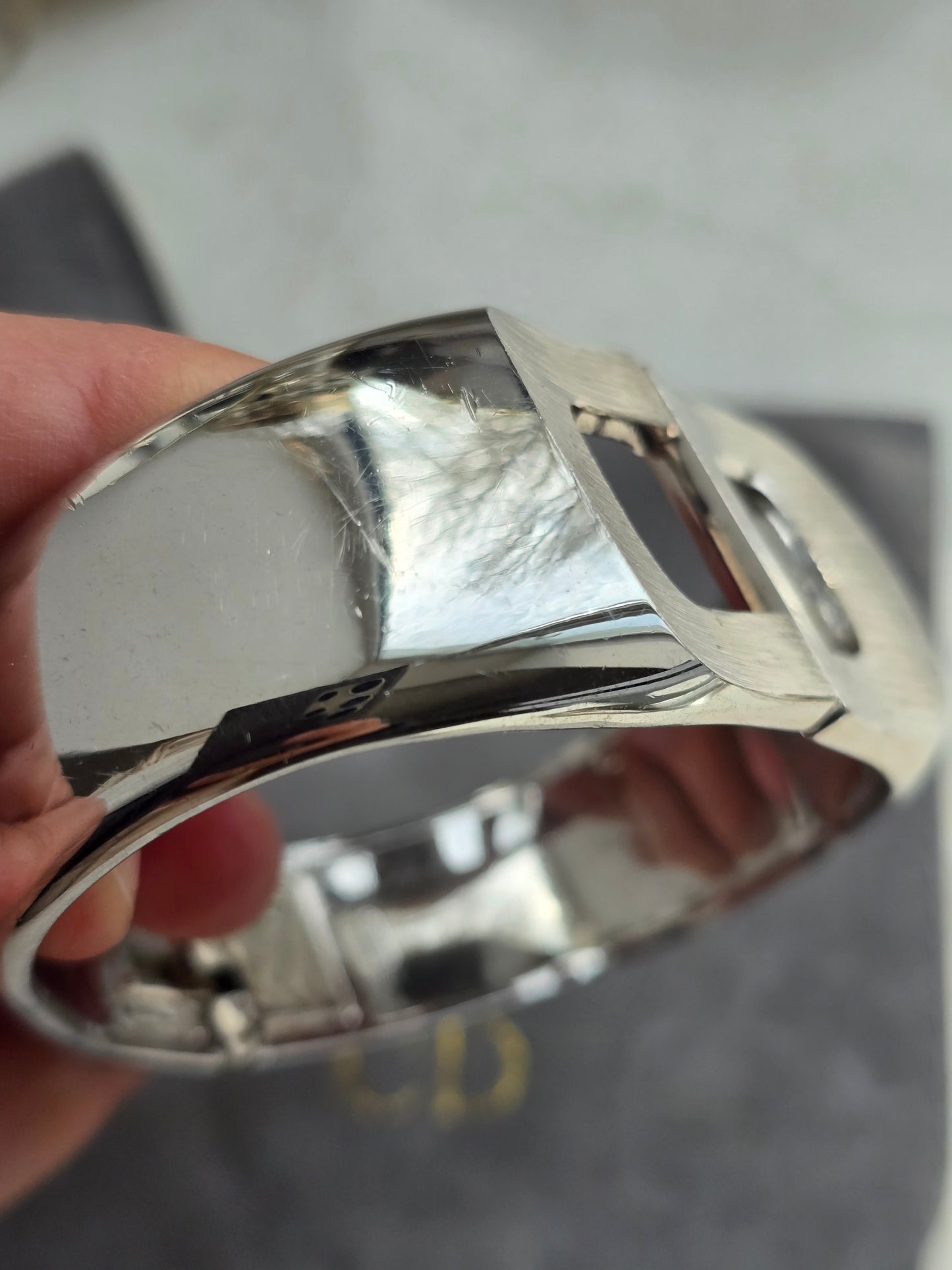 Vintažinė 1972m. sidabro spalvos CHRISTIAN DIOR apyrankė