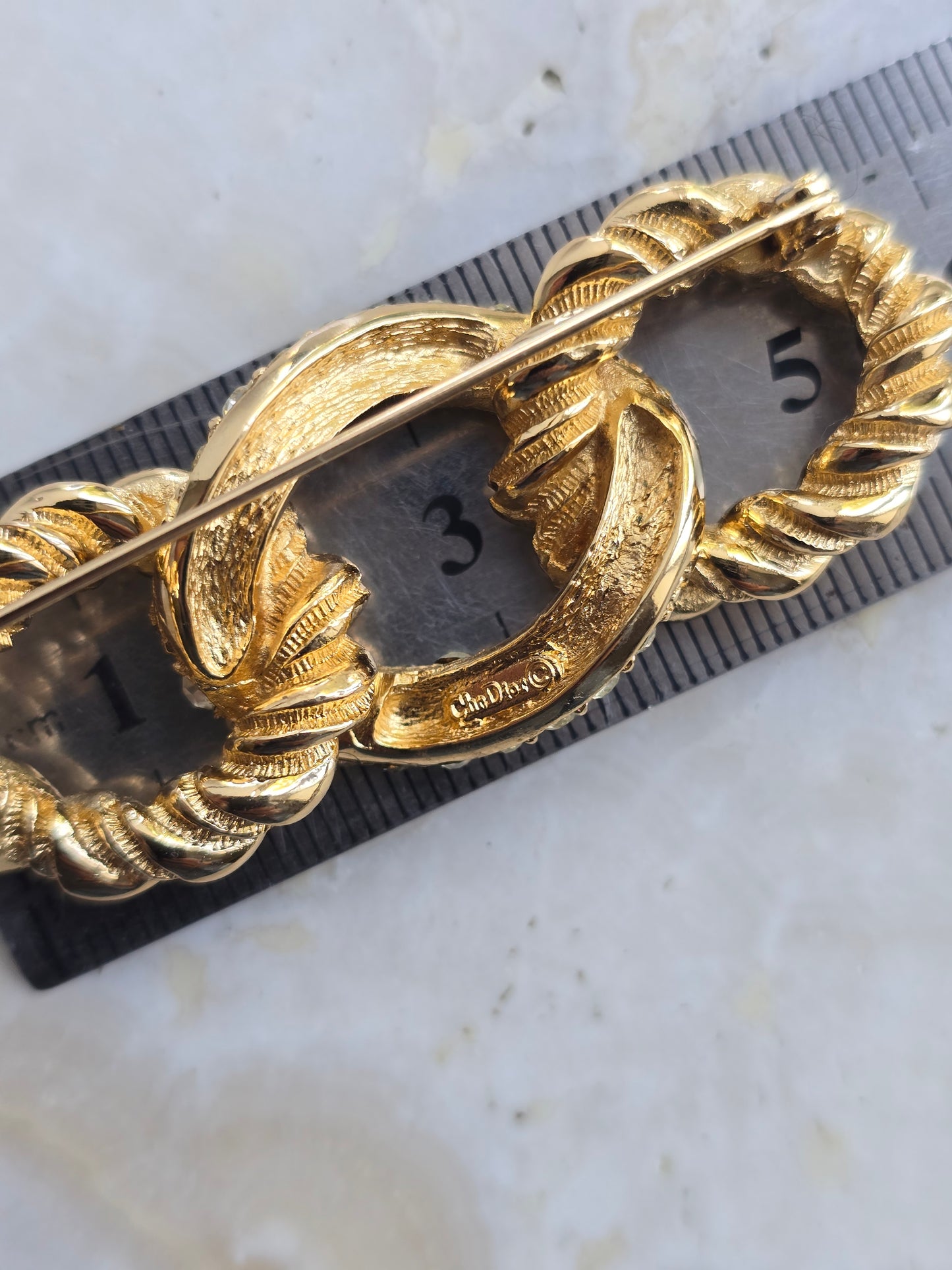 Vintažinė Christian Dior sagė pinta virvė
