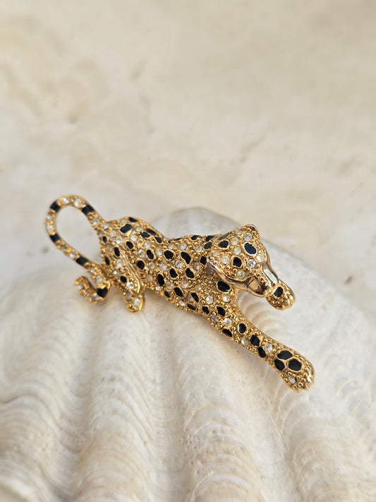 Vintažinė aukso spalvos sagė leoardas