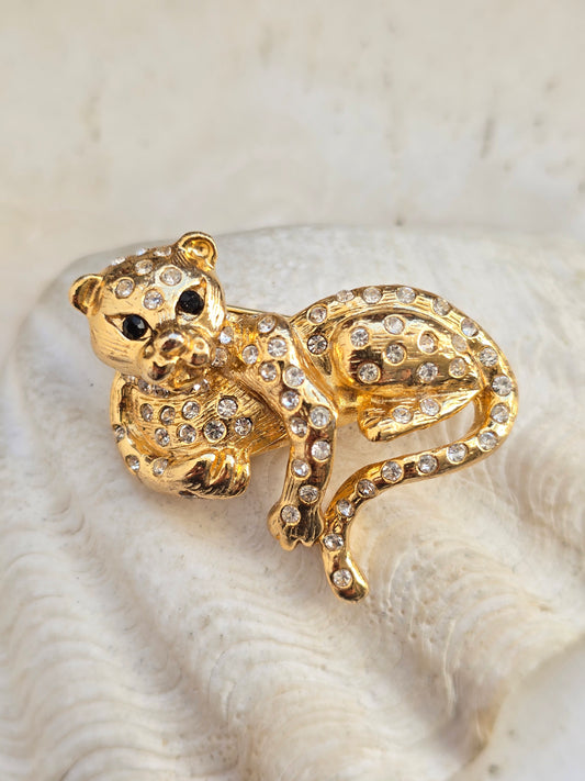 Vintažinė aukso spalvos sagė leopardas