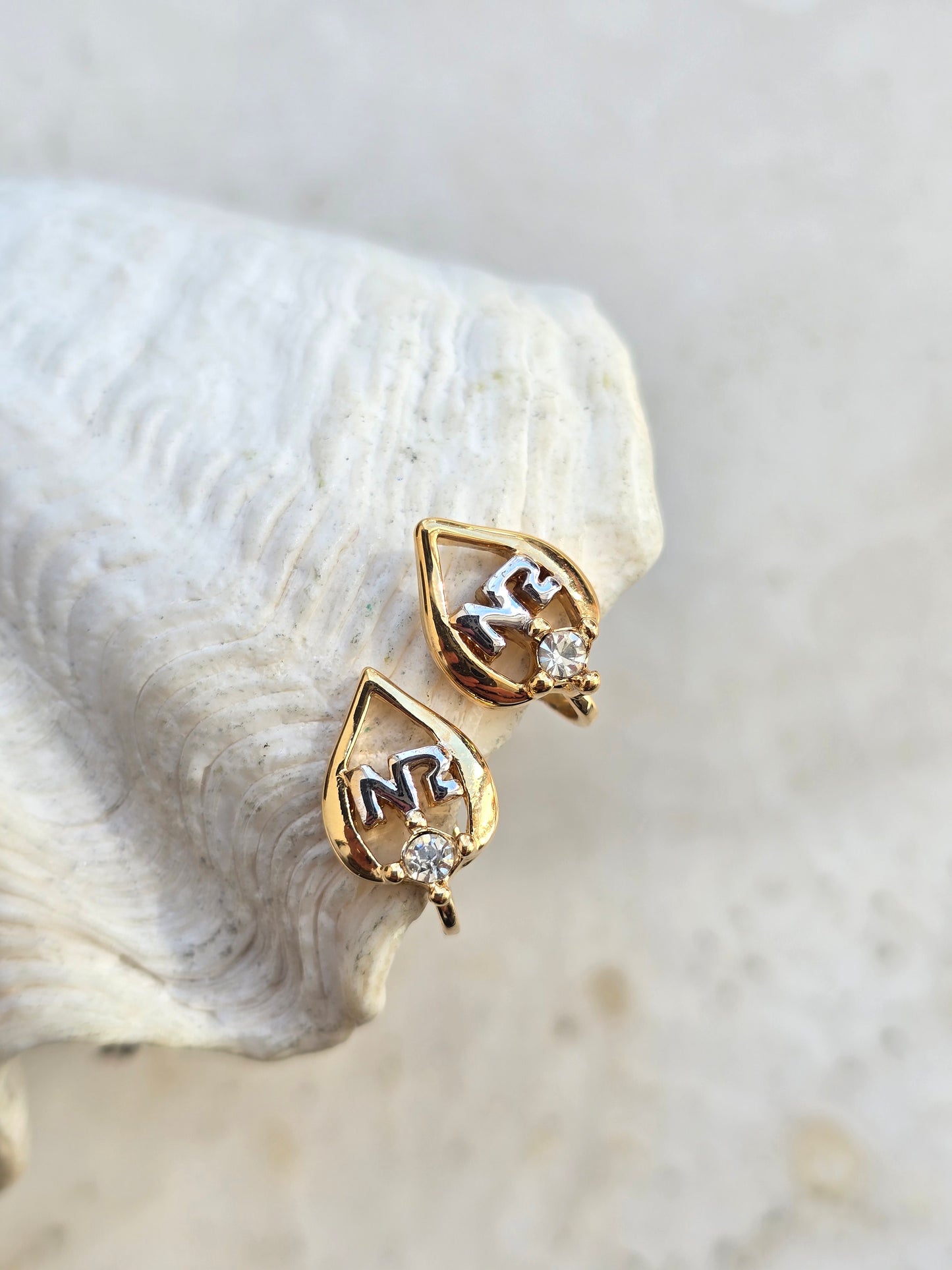 Vintažiniai paauksuoti Nina Ricci klipsai