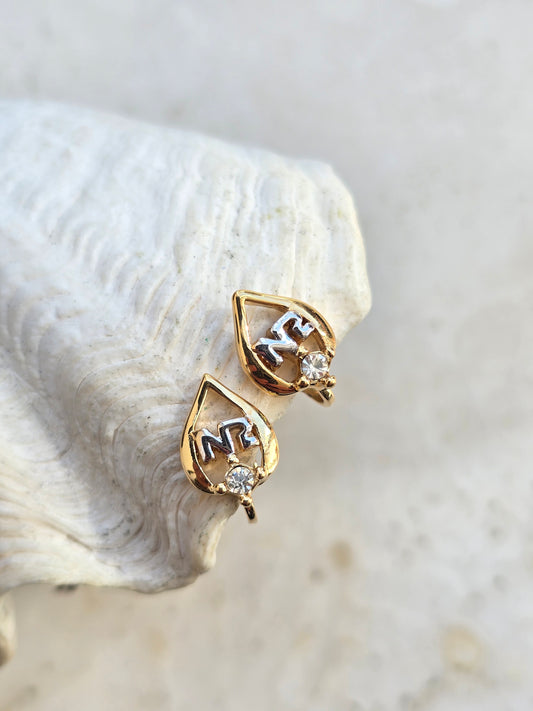 Vintažiniai paauksuoti Nina Ricci klipsai