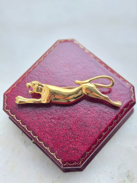 Vintažinė aukso spalvos sagė pantera