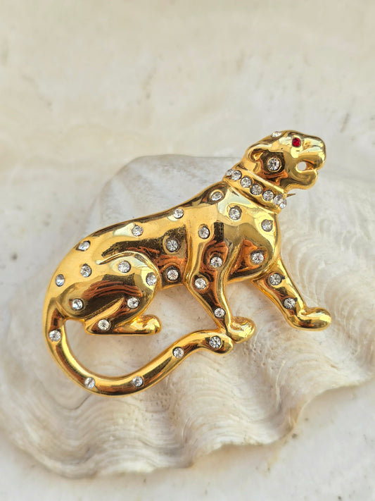 Vintažinė aukso spalvos sagė pantera