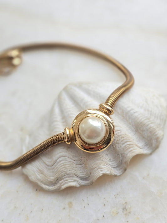 Sendinto aukso spalvos AGATHA PARIS kaklo papuošalas