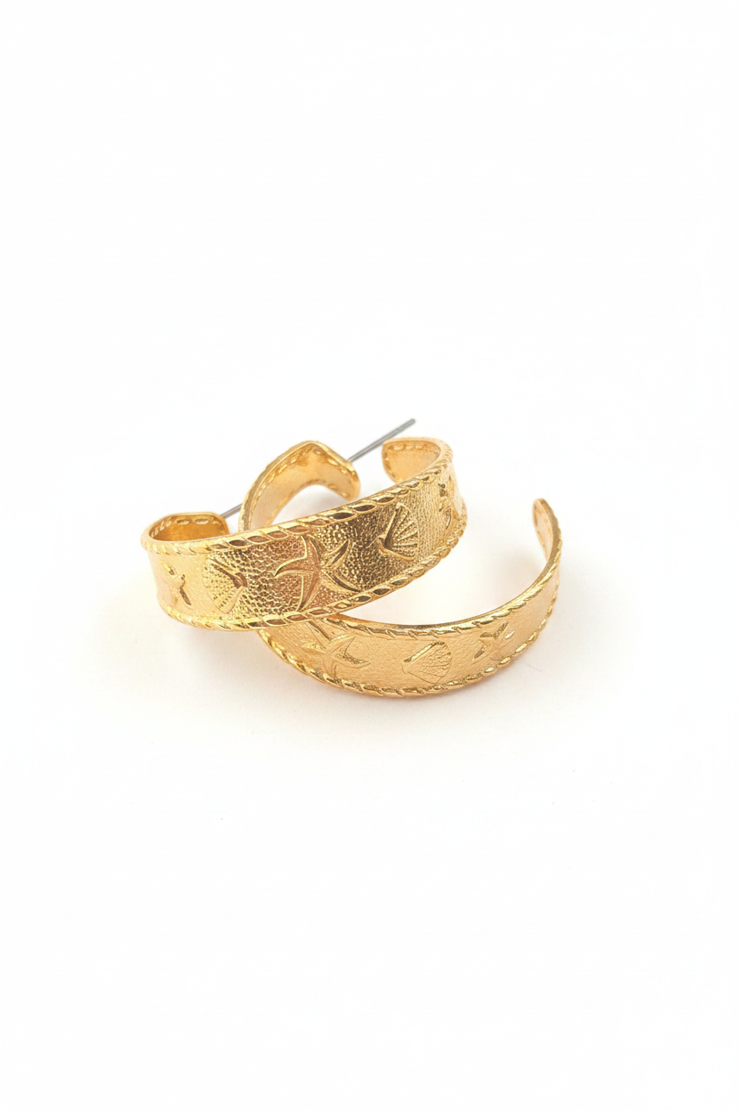 Gold-colored hoop earrings