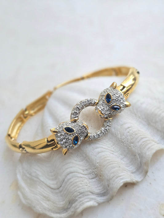 Vintažinė aukso spalvos apyrankė su stiklo kristalais panteros