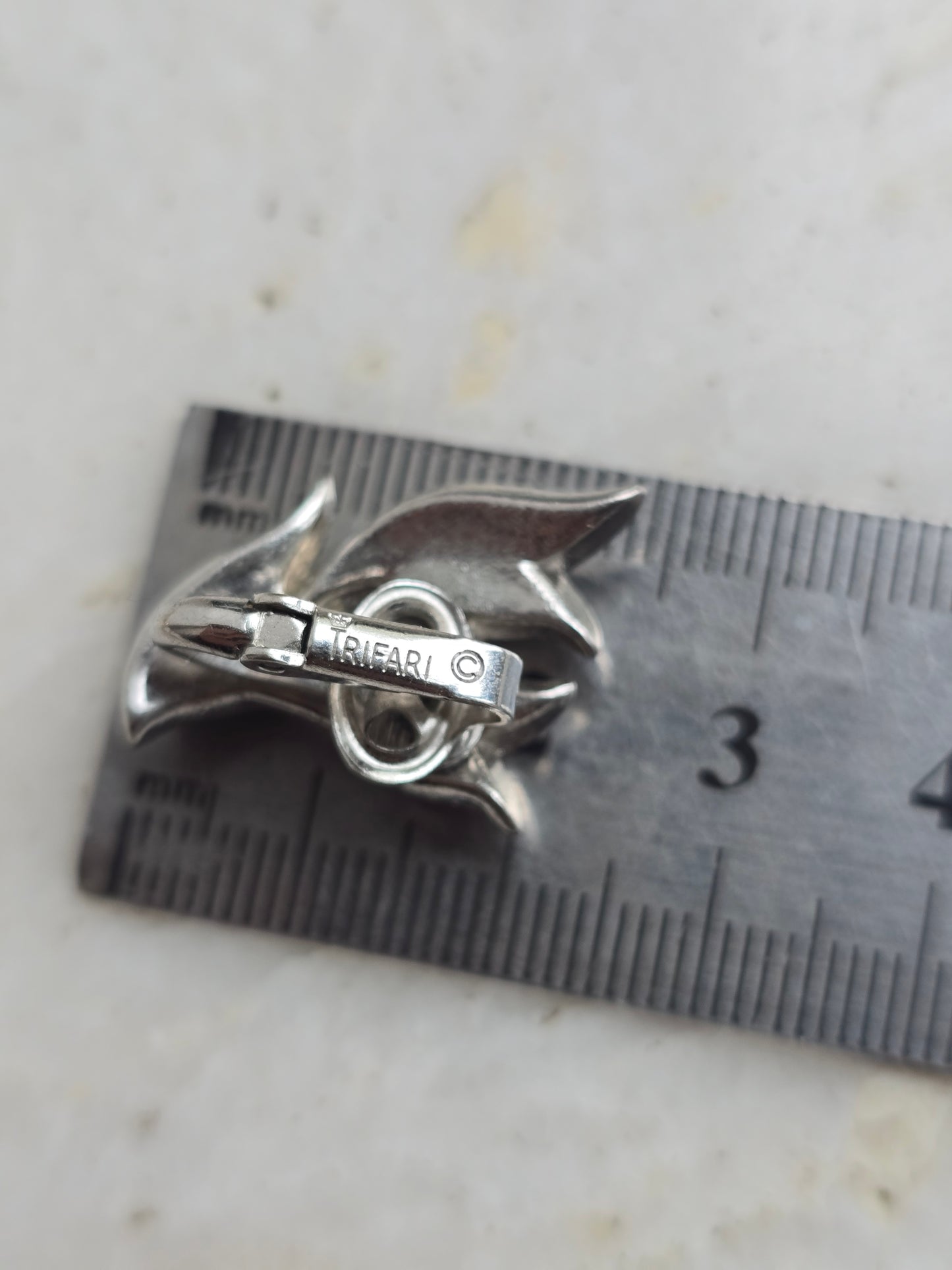 Vintažiniai sidabro spalvos TRIFARI klipsai