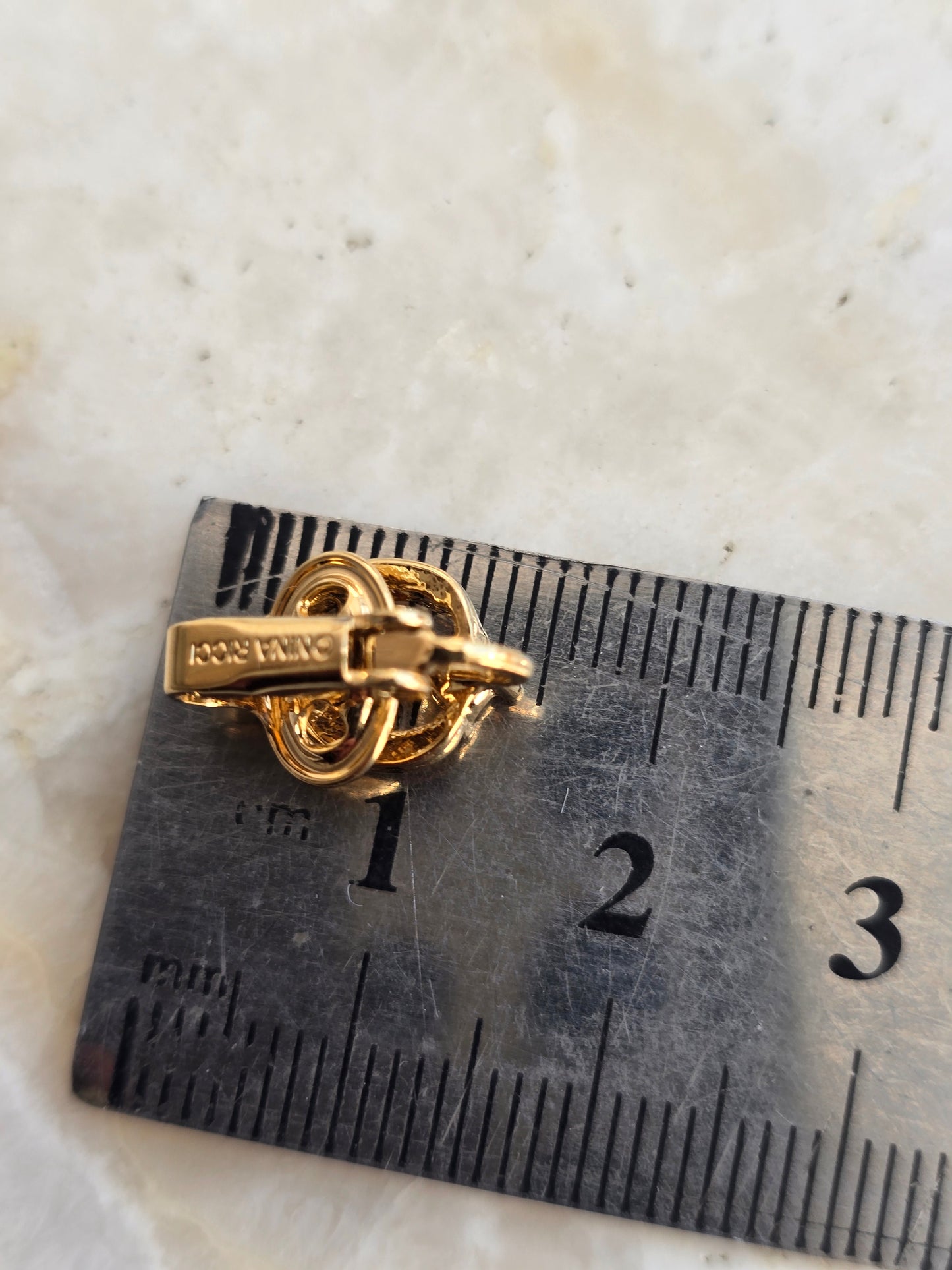 Vintažiniai paauksuoti Nina Ricci klipsai