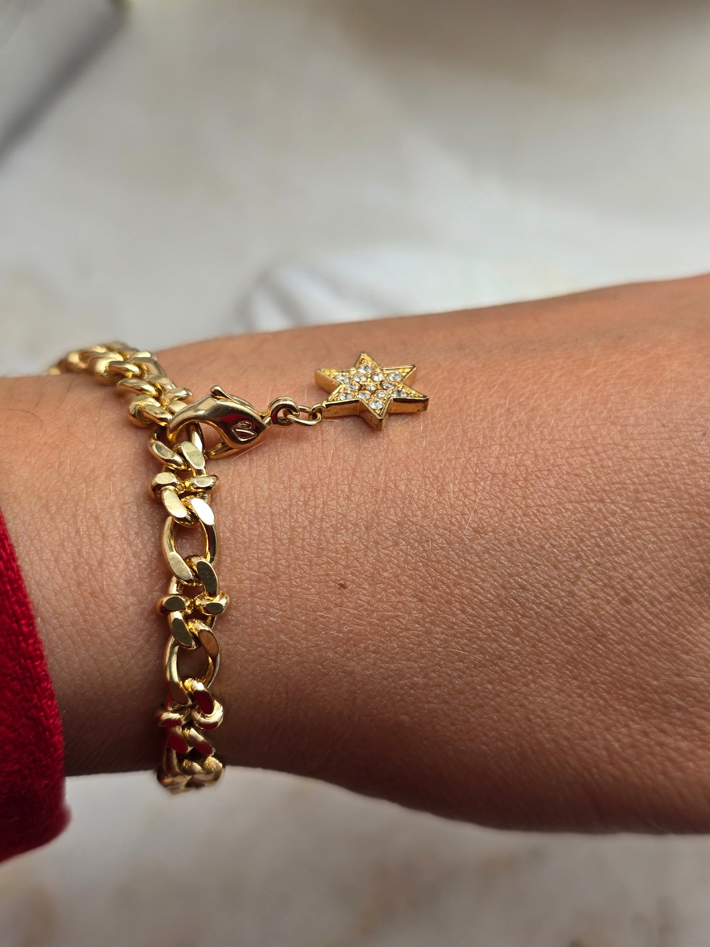 Aukso spalvos apyrankė su prisegamu Swarovski pakabuku žvaigžde