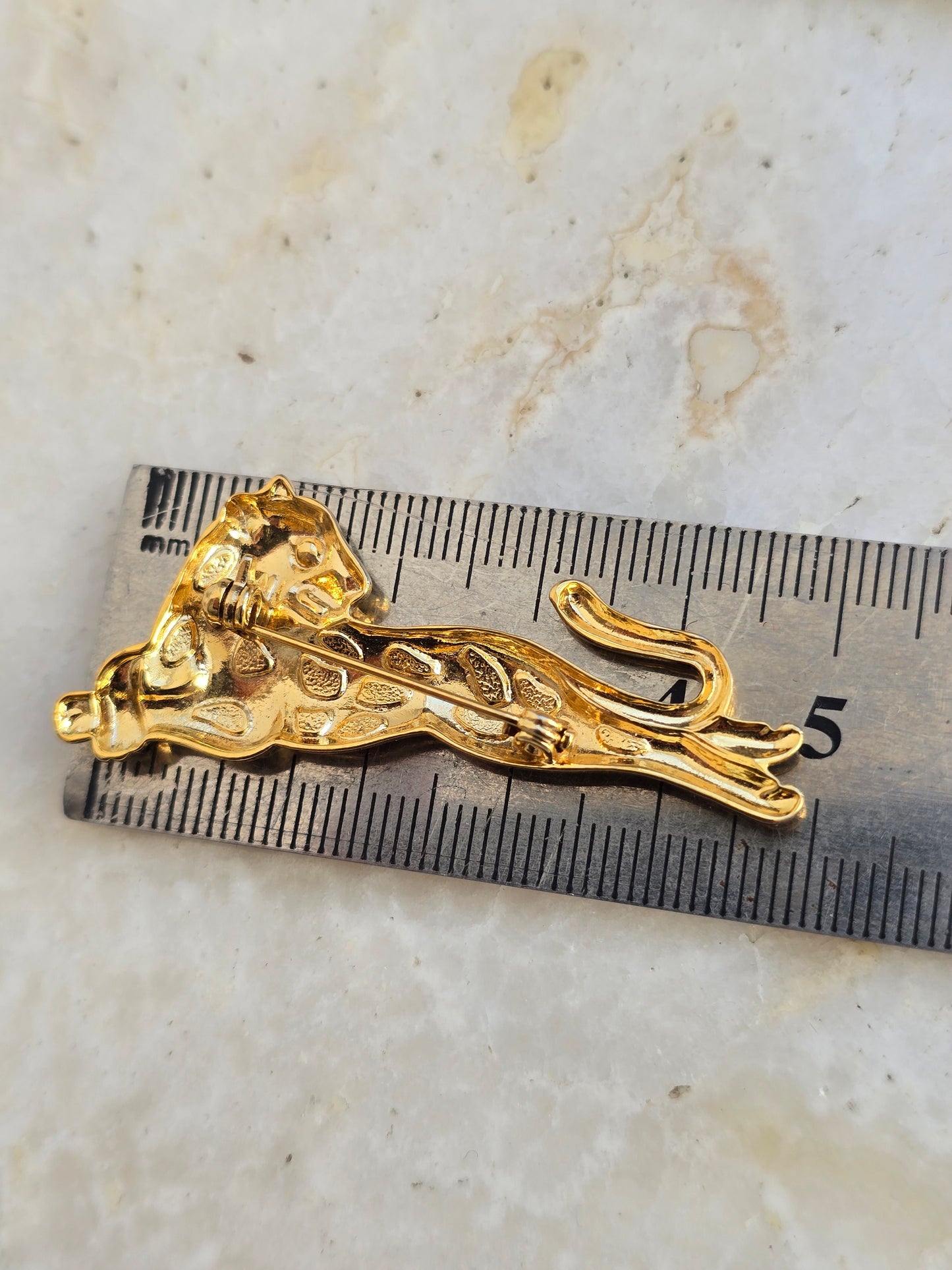 Vintažinė aukso spalvos sagė leopardas