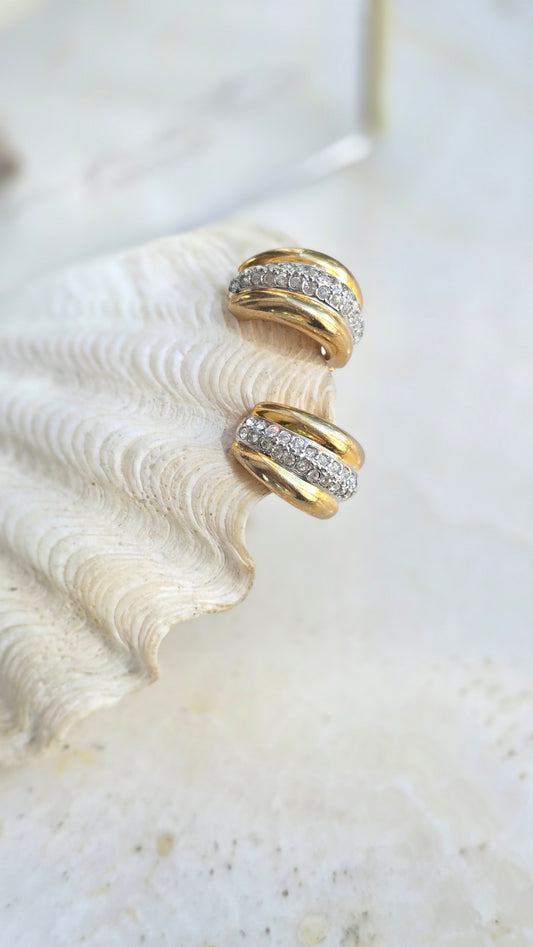 Gold-colored clips with glass crystals